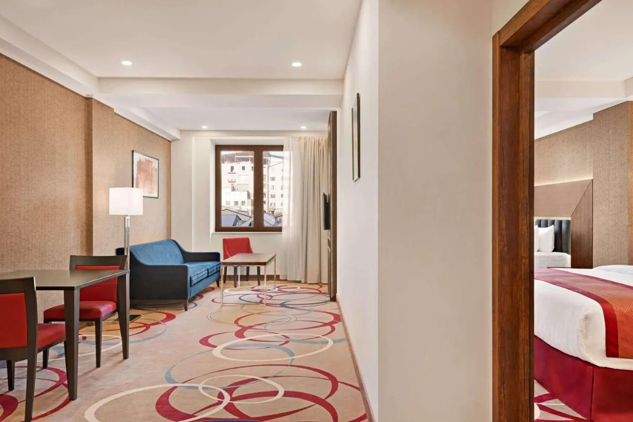 Ramada Hotel & Suites by Wyndham Yerevan slide-4