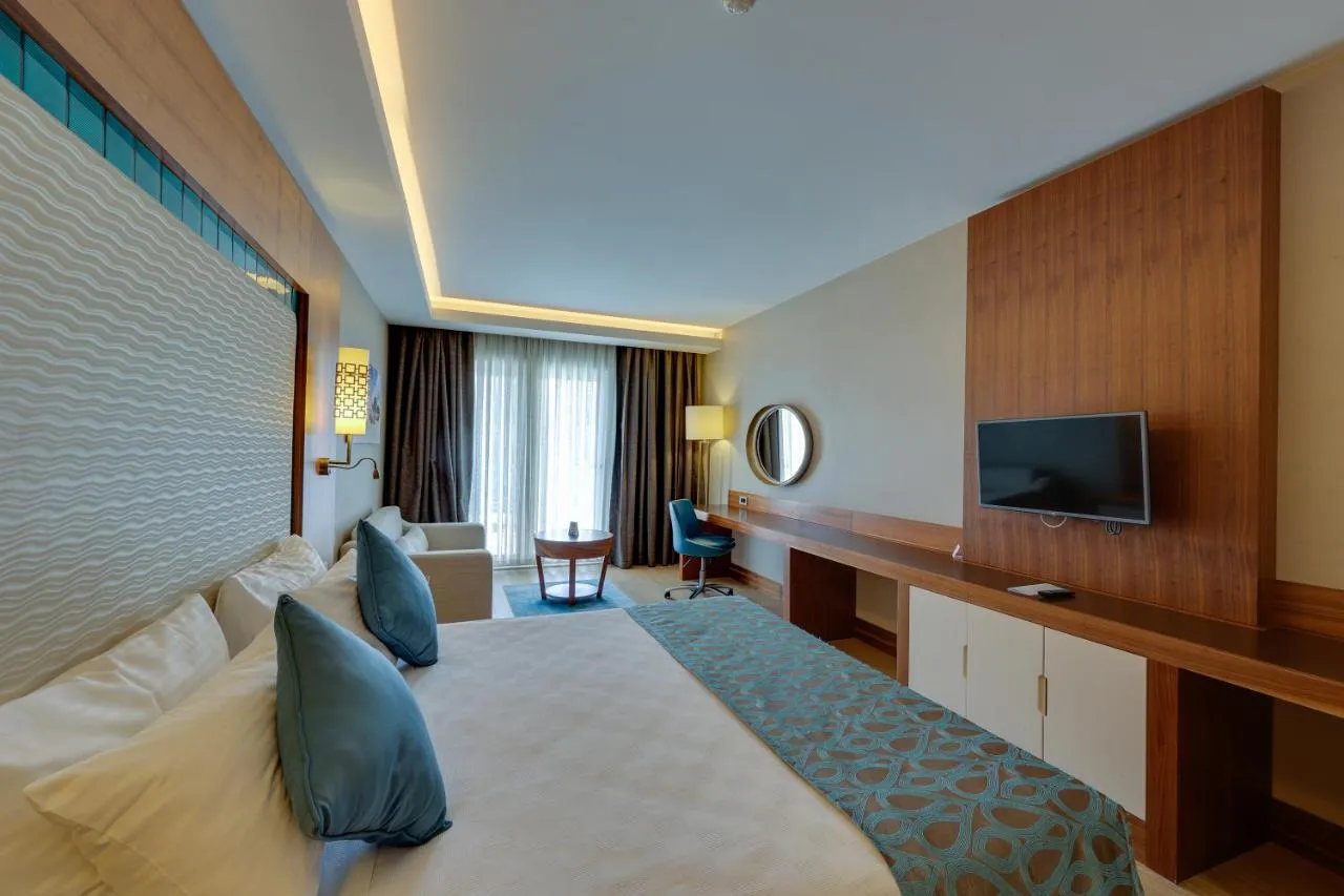 Ramada Hotel & Suites by Wyndham Kusadasi slide-4