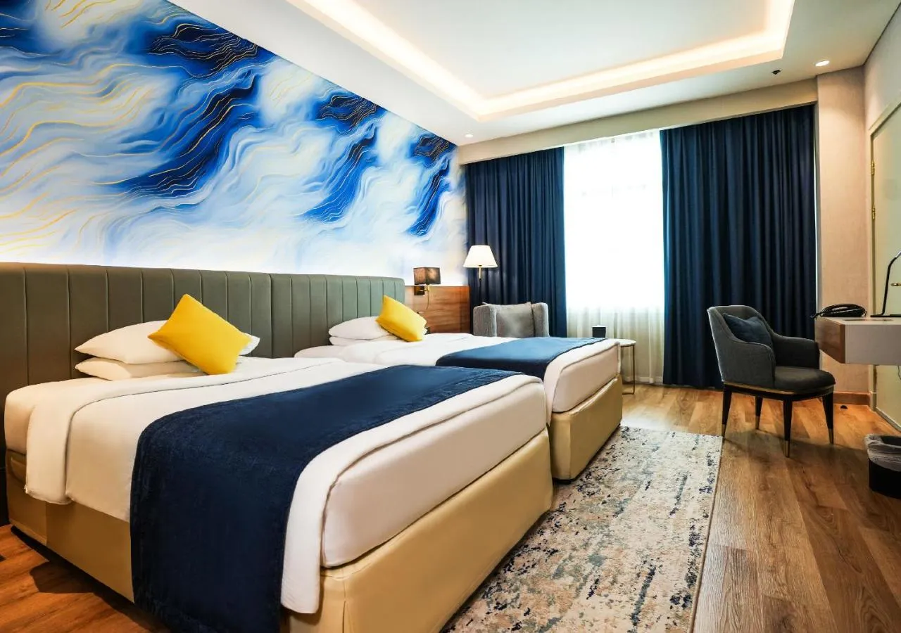 Movenpick Grand Al Bustan Dubai slide-4