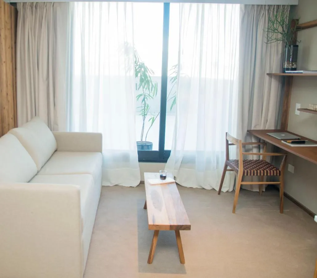 AQ Tailored Suites hotel slide-4
