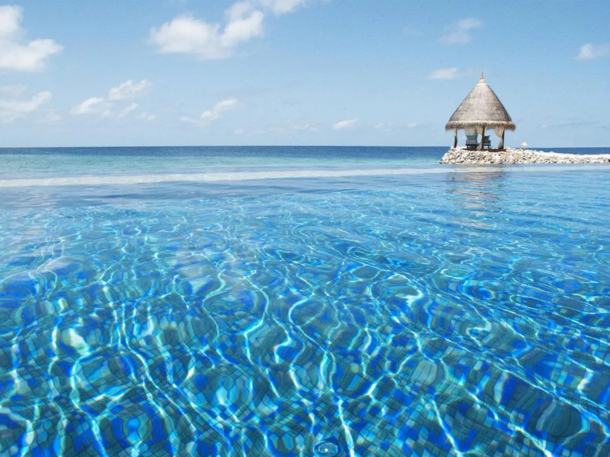 Taj Coral Reef Resort & Spa Maldives slide-5
